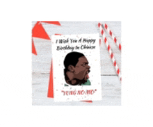 a birthday card with a picture of a man on it and a candy cane .