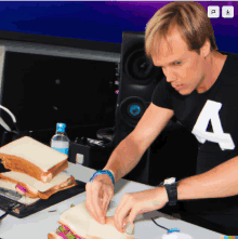 Armin Van Buuren Mixing GIF - Armin Van Buuren Mixing Sandwiches GIFs