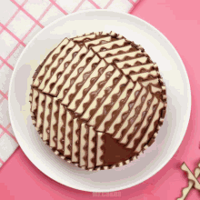 a white plate with a cake on it that says mr cakes
