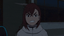 a girl with pink hair has her hands on her head in a dark room
