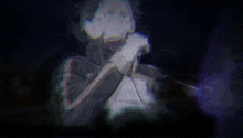 a blurry image of a man holding a microphone