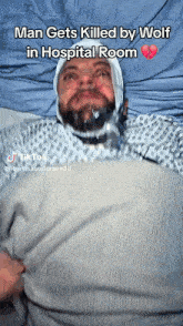 a man is laying in a hospital bed with a bandage on his head