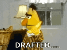 bert from sesame street says drafted in a room