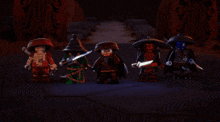 a group of lego figures are standing next to each other holding swords