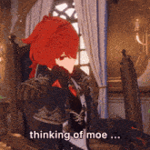 a red haired anime character is sitting in a chair with the words " thinking of moe " below him