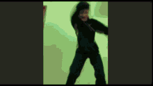 a green screen with a shadow of a person on it .