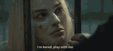 Robbie Margot Im Bored Play With Me GIF