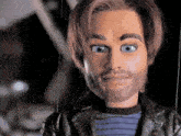 a close up of a puppet with a beard