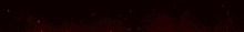 a red light is shining on a black background