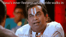 a man with a white triangle on his forehead says vasu 's inner feelings when bride walks