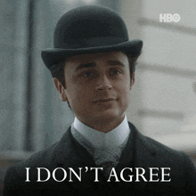 a man in a suit and bowler hat says " i don 't agree "