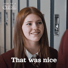 a girl in a school uniform says that was nice in front of lockers
