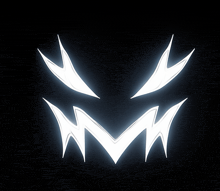 a black background with a white glowing face