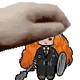a hand is holding a cartoon character with red hair and a shield .