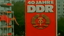 a red sign that says 40 jahre ddr in white letters