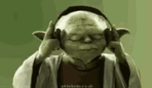 yoda jamming headphones music