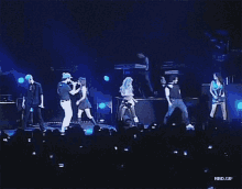 a group of people on a stage with a watermark that says rbd.gif on it