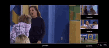 a screen shows a woman screaming at another woman in a room with camara 1 2 and 3