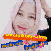 a woman wearing a pink hijab is surrounded by hearts and the words " waalaikumsalam "