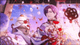 a man in a kimono is holding a container with flowers on it