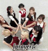 a group of girls are holding hands in a circle with the word prayer written on the bottom