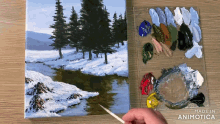 a person is painting a snowy landscape with a palette in the background that says made in animatica