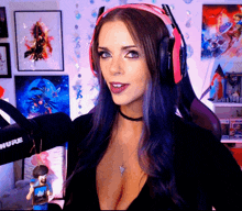 a woman wearing headphones with the word shure on the microphone