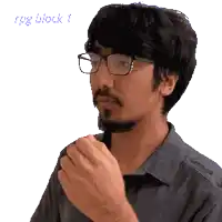 a pixelated image of a man wearing glasses and a beard with the word feedback below him
