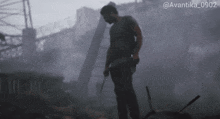 a man holding a knife in front of a building with the hashtag avantika0902
