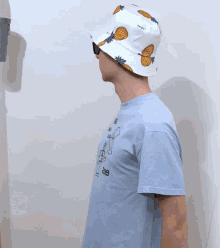 a man wearing a hat and sunglasses has a shirt that says sre neu-ulm 2019