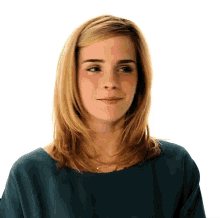 a woman with blonde hair and a blue shirt looks at the camera