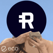 a woman is holding a stack of money in front of a circle with a letter r on it