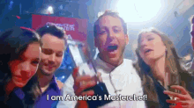 a group of people are standing around a man who says i am america 's master chef