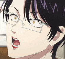 a close up of a person 's face with glasses and their mouth open
