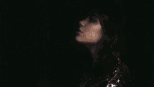 a close up of a woman 's face with the words jazzytraa on the bottom