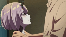 a cartoon character with horns is being held by a man