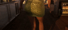 a woman in a green dress stands in front of a bar