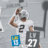 a football player with the name carlson on the back of his jersey