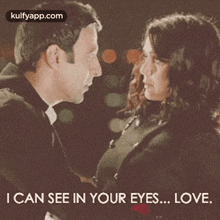 a man and a woman are looking into each other 's eyes and the man says " i can see in your eyes ... love "