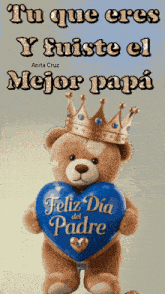 a teddy bear wearing a crown is holding a heart that says feliz dia padre