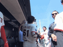a baseball player named j.n. lee wears number 51