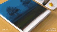 a painting of trees is being painted on a canvas by joony art