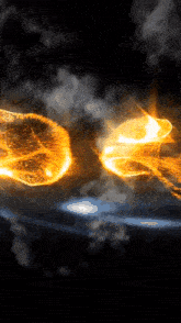 a basketball is on fire in a dark sky