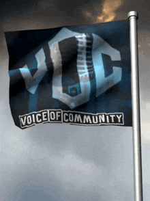 a flag that says voice of community is flying in the wind
