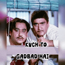 two men looking out of a window with the words kuch to gadbad hai on the bottom