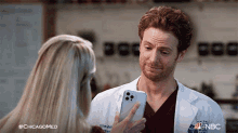 Look At My Phone Dr Will Halstead GIF - Look At My Phone Dr Will Halstead Chicago Med GIFs