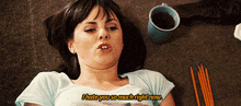 a woman is laying on the floor and says " i hate you so much right now . "