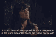 a woman is talking about being as close as possible to a person in the world .