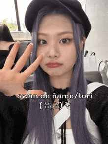 a girl with purple hair is wearing a hat and has the name swan de ñame / tori on the bottom