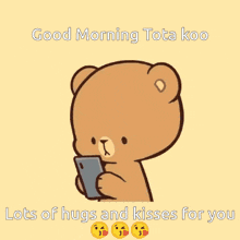 a cartoon character is holding a cell phone and says good morning tot a koo